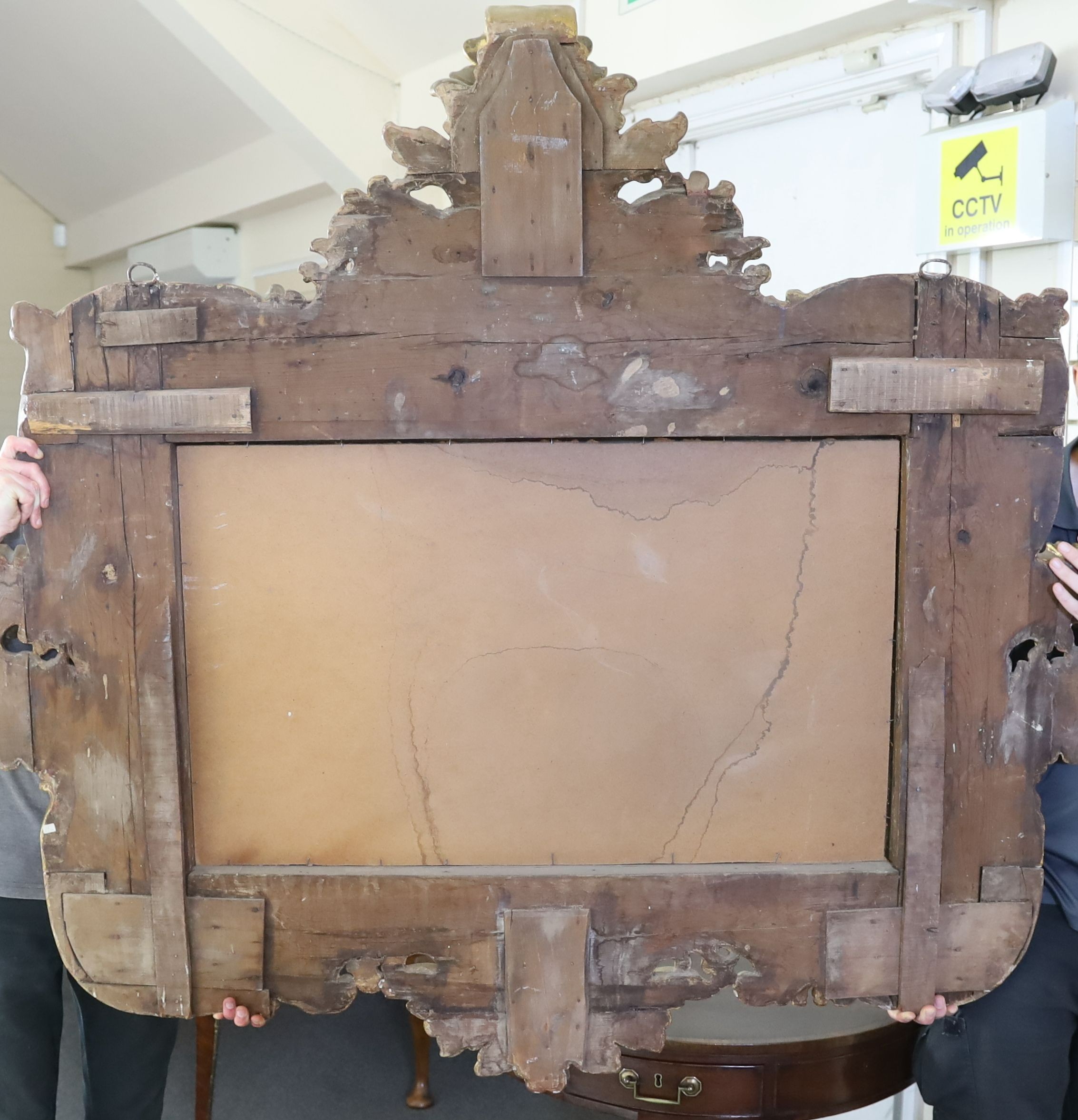 A mid 19th century Florentine ornately carved giltwood wall mirror, W.166cm H.158cm